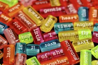 Colourful tiles with single words written on them