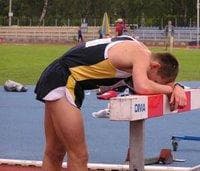 Runner bent over