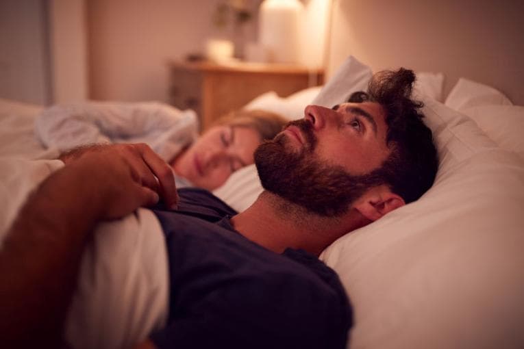 Couple trying to sleep